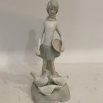 Vintage girl figurine with basket and chickens Japan