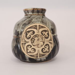 Ceramic vase with a relief decoration.