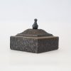 Vintage decorative box with a textured exterior and a lid